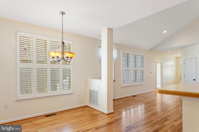 101 Forget Me Not Dr, White Post, VA 22663 - unfurnished dining area with a chandelier, light wood-style floors, baseboards, lofted ceiling, and recessed lighting