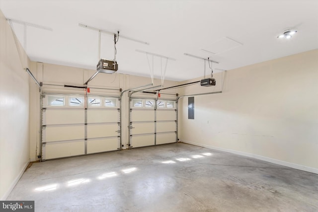 101 Forget Me Not Dr, White Post, VA 22663 - garage featuring a garage door opener, baseboards, and electric panel