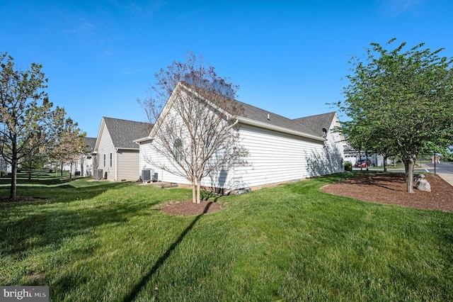 101 Forget Me Not Dr, White Post, VA 22663 - view of property exterior with central AC and a lawn