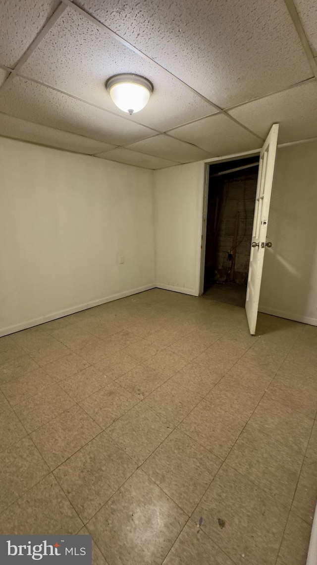 empty room with a drop ceiling