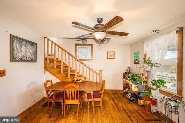 dining area featuring hardwood / wood-style flooring and ceiling fan