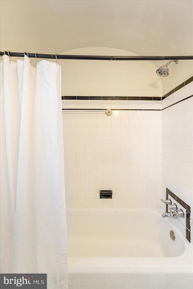 841 E Belvedere Ave E, Baltimore, MD 21212 - full bathroom featuring shower / bath combo with shower curtain