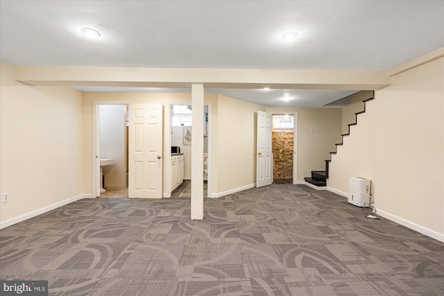 841 E Belvedere Ave E, Baltimore, MD 21212 - below grade area with carpet, stairs, and baseboards