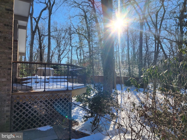 view of snow covered pool