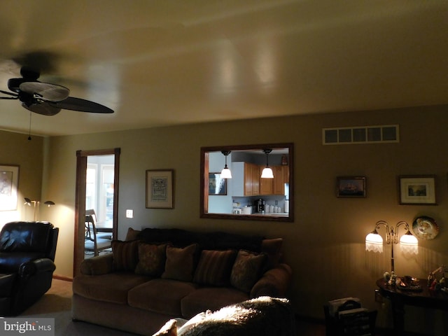 living room with ceiling fan