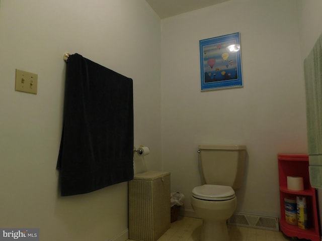 bathroom featuring toilet