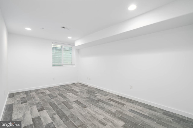 empty room featuring wood-type flooring