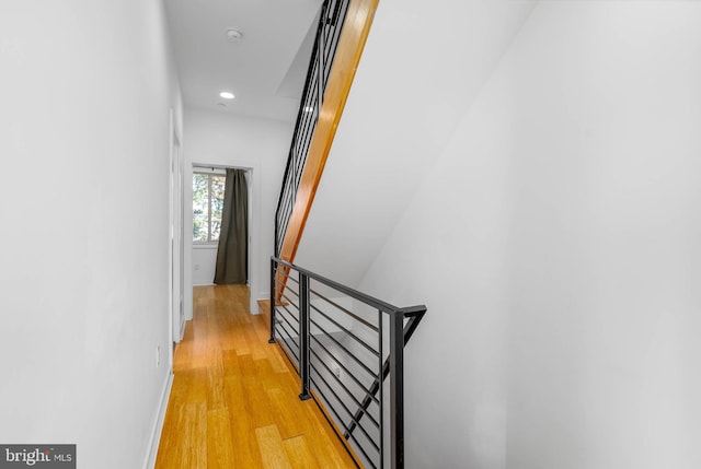 hall with light wood-type flooring