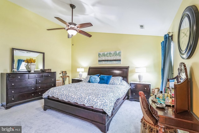 carpeted bedroom featuring ceiling fan and lofted ceiling