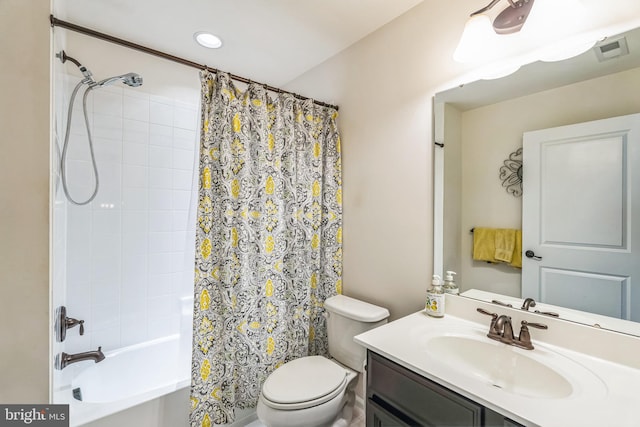 full bathroom featuring vanity, toilet, and shower / bath combo with shower curtain