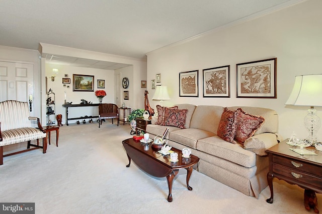 carpeted living room featuring ornamental molding