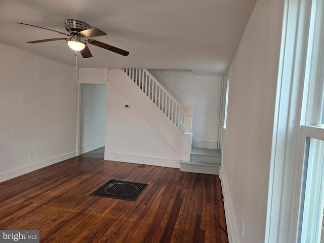 interior space with dark hardwood / wood-style floors and ceiling fan