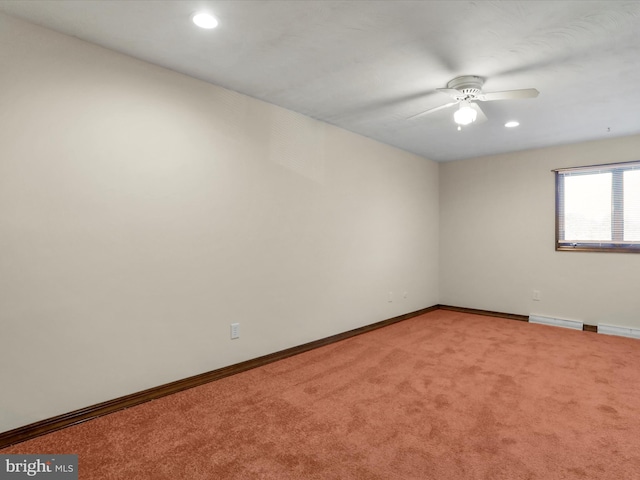 carpeted empty room with ceiling fan