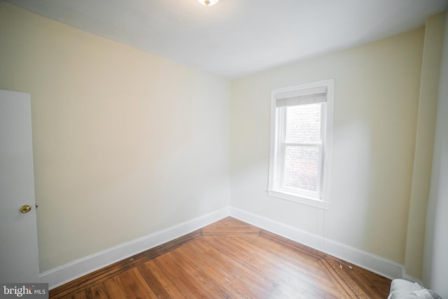 empty room featuring hardwood / wood-style floors