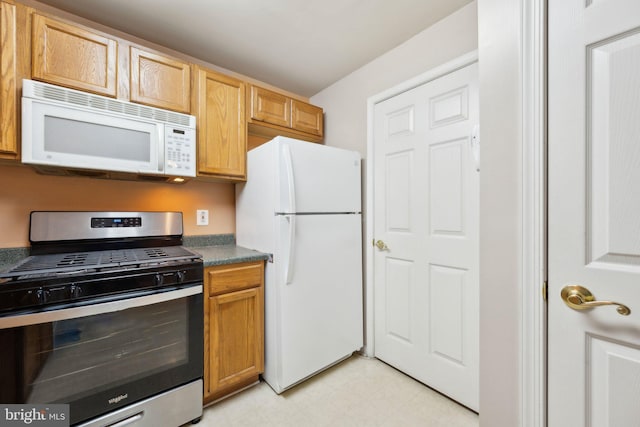 kitchen featuring white appliances