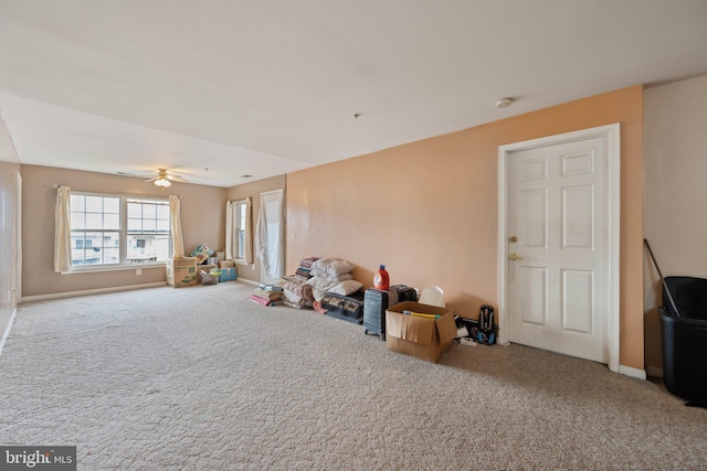 playroom with carpet floors and ceiling fan