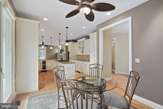 130 Wedgewood Ln, Haddonfield, NJ 08033 - dining area featuring beverage cooler, ceiling fan, light wood-style flooring, and recessed lighting