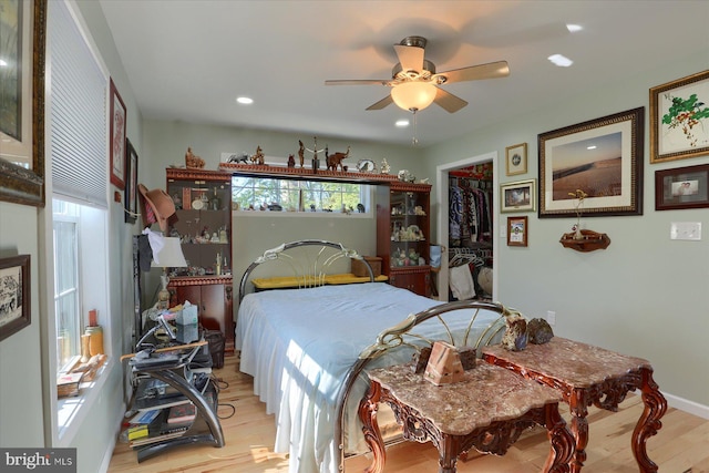 bedroom featuring light wood-style floors, ceiling fan, baseboards, and recessed lighting