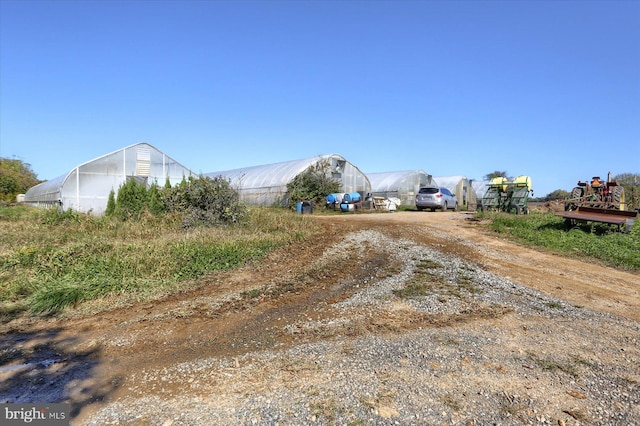 view of street featuring a greenhouse