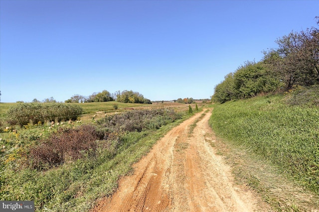 view of road featuring a rural view