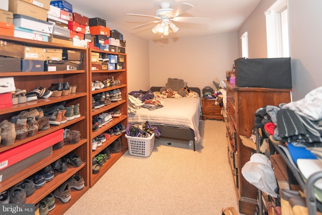 bedroom featuring ceiling fan and carpet floors