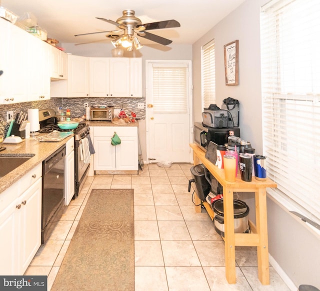 kitchen featuring white cabinets, black dishwasher, light tile patterned flooring, and electric stove