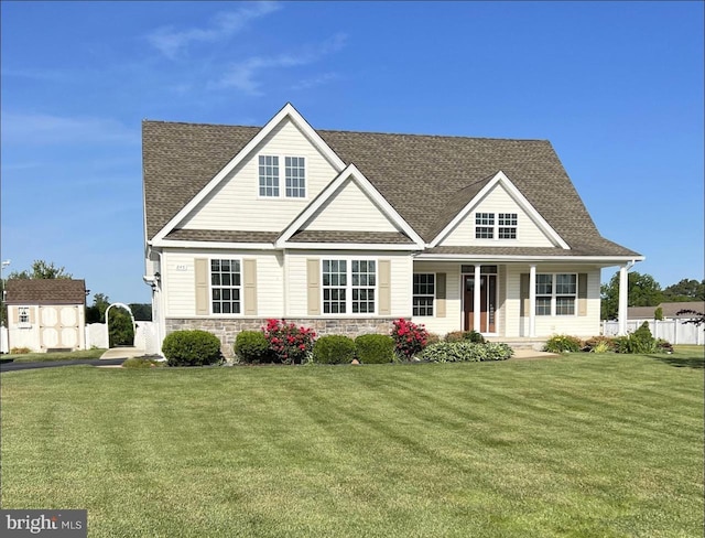 view of front of property with a front lawn and a porch