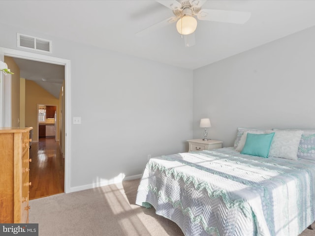 carpeted bedroom with ceiling fan