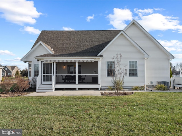 back of property featuring central AC, a lawn, and a sunroom