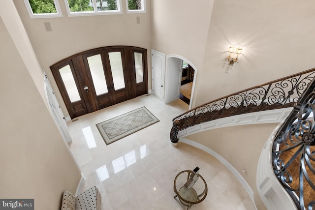 entryway featuring a high ceiling