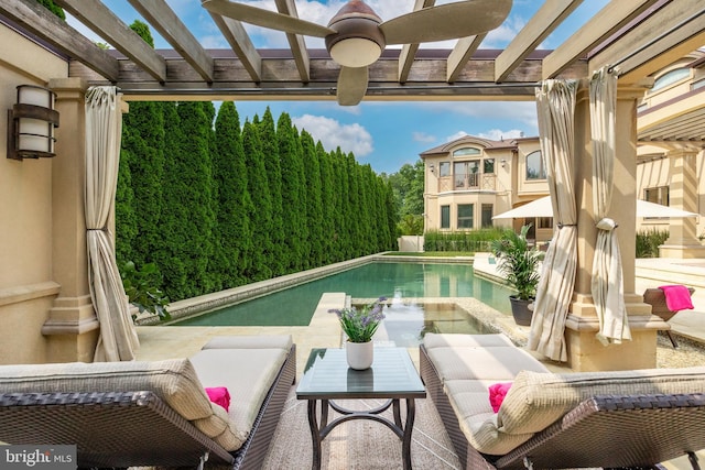 view of swimming pool featuring a pergola