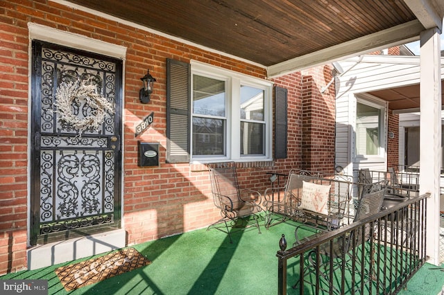 view of patio featuring a porch