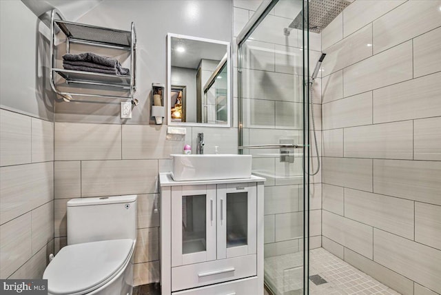 5449 Depues Rd, Bangor, PA 18013 - full bathroom featuring a stall shower, tile walls, vanity, and toilet