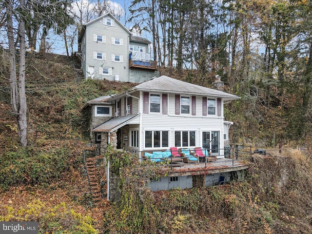 5449 Depues Rd, Bangor, PA 18013 - view of front of property featuring a chimney, a wooden deck, and an outdoor hangout area