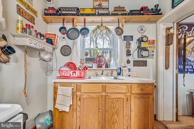 5449 Depues Rd, Bangor, PA 18013 - kitchen featuring light countertops, a sink, and brown cabinets