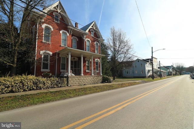 view of front of home featuring covered porch