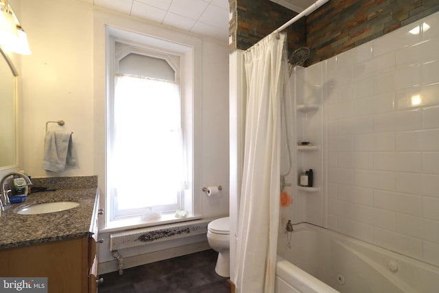 full bathroom featuring vanity, shower / bath combination with curtain, and toilet