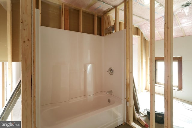 bathroom featuring washtub / shower combination