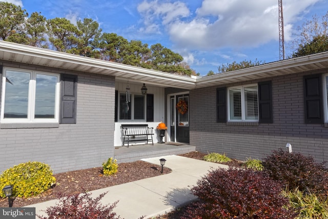 entrance to property with a porch