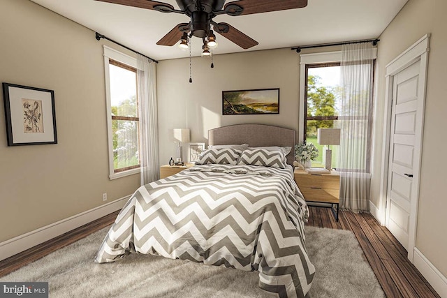 bedroom featuring ceiling fan and hardwood / wood-style flooring