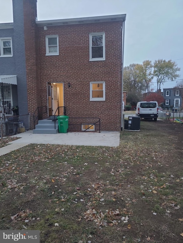 view of front of house featuring central AC unit