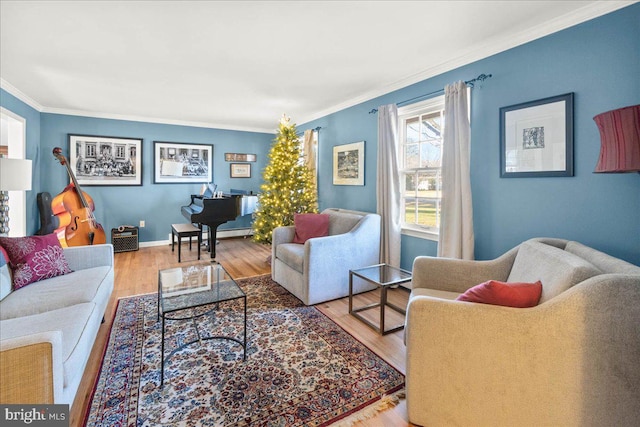 living room with ornamental molding and light wood-type flooring