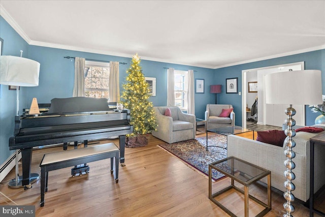 living room with light hardwood / wood-style flooring and ornamental molding