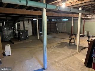 basement featuring water heater