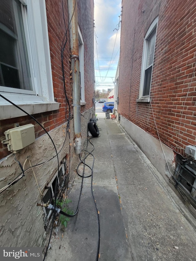 view of side of home featuring a patio