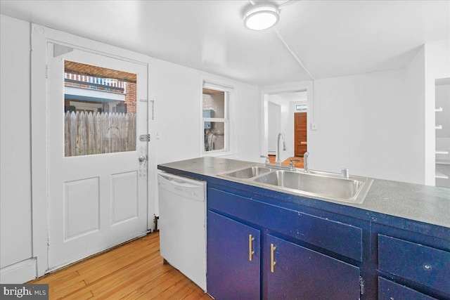 kitchen featuring white dishwasher, light hardwood / wood-style floors, blue cabinets, and sink