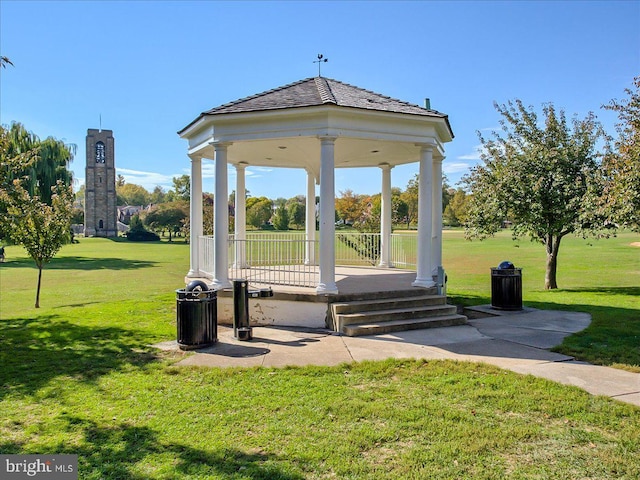 view of property's community featuring a gazebo and a lawn