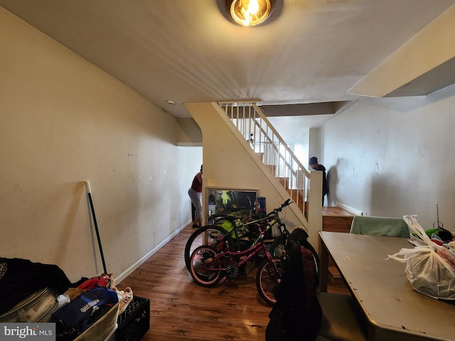 stairs with wood-type flooring