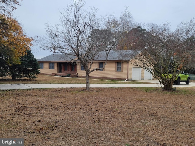 ranch-style home with a garage