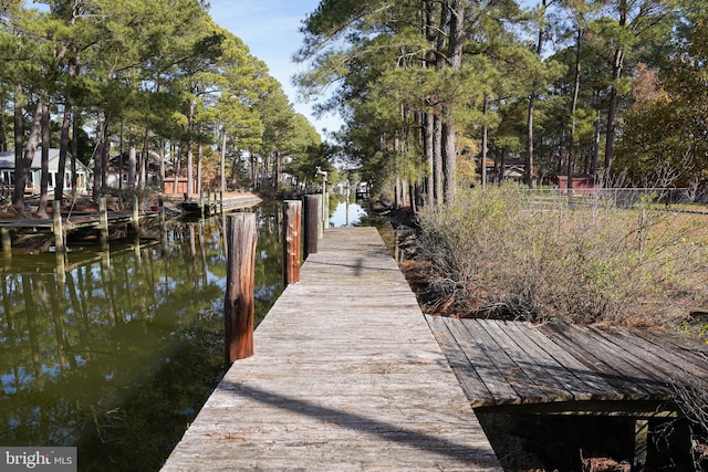 view of dock with a water view